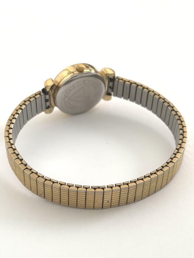 Tiny Gold Guess Watch
