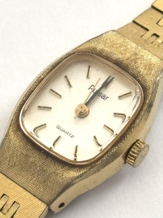 White and Gold Pulsar Watch