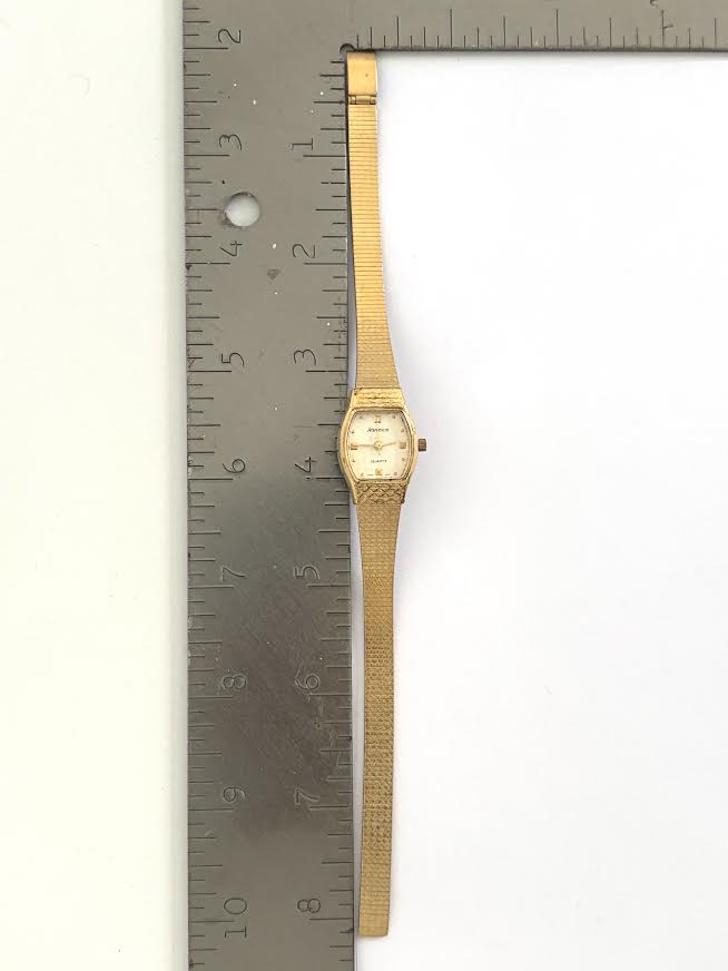 Adjustable Gold and Cream Watch.