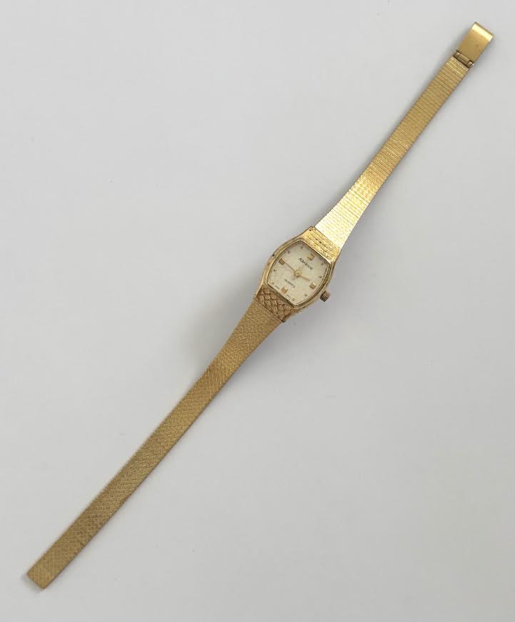 Adjustable Gold and Cream Watch.