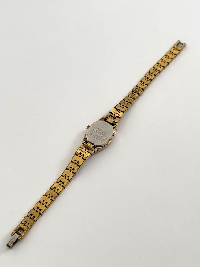 Dainty Gold Pulsar Watch