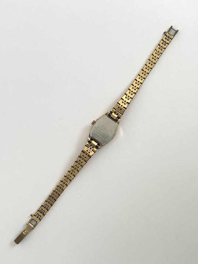 White and Gold Pulsar Watch
