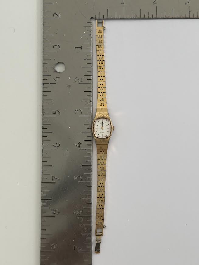 White and Gold Pulsar Watch